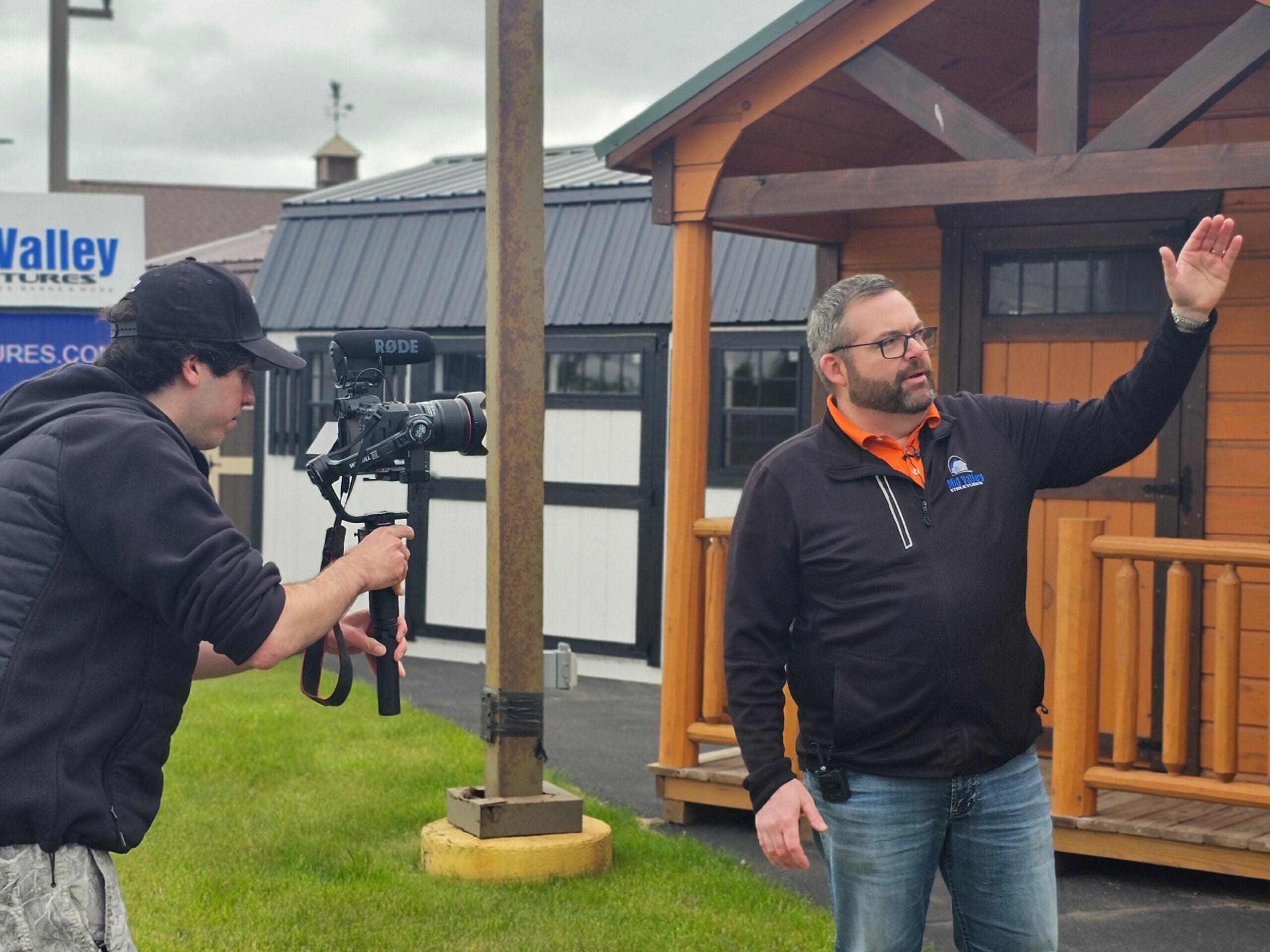 Videographer Chris filming a client