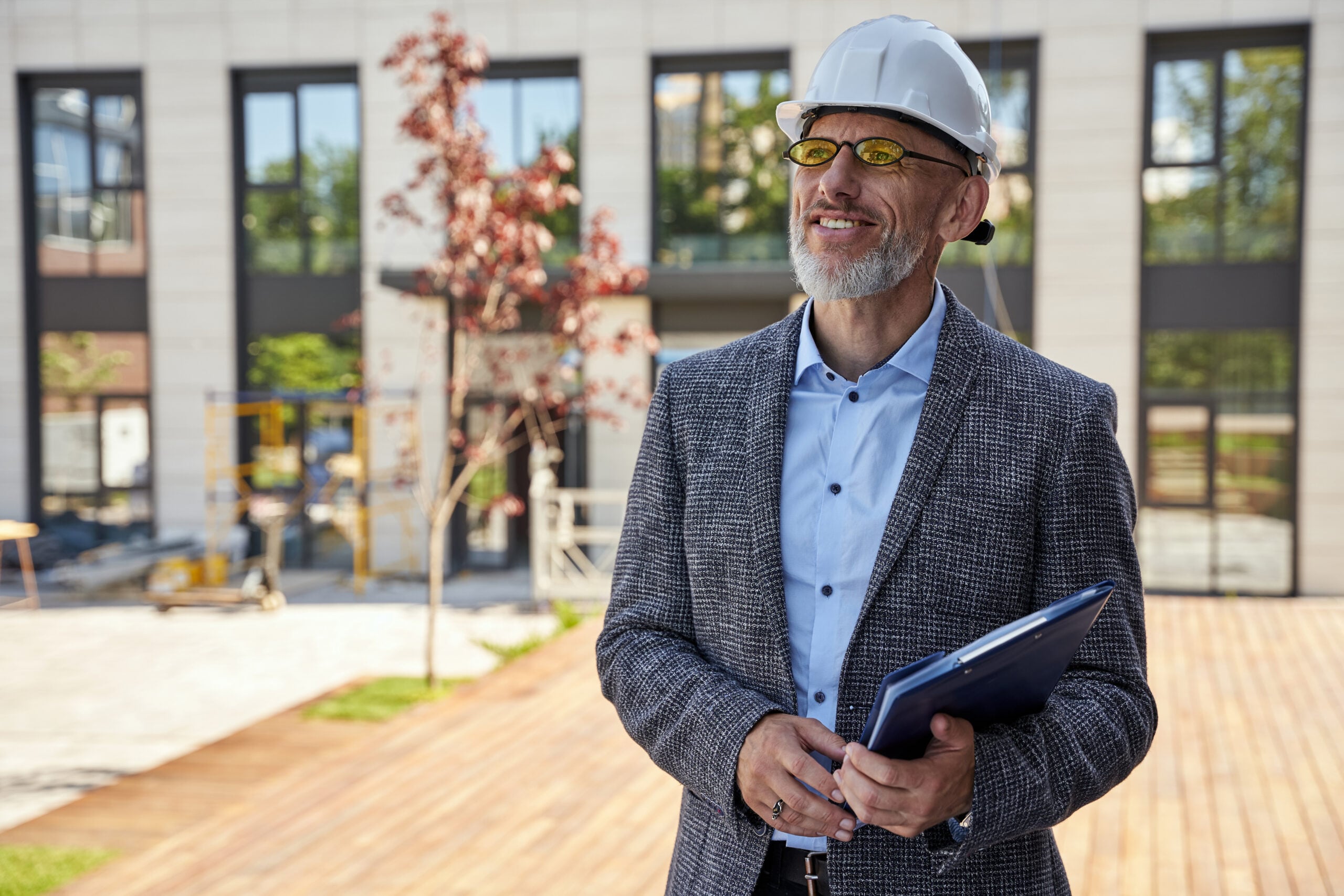 Business owner contractor inspecting a property.